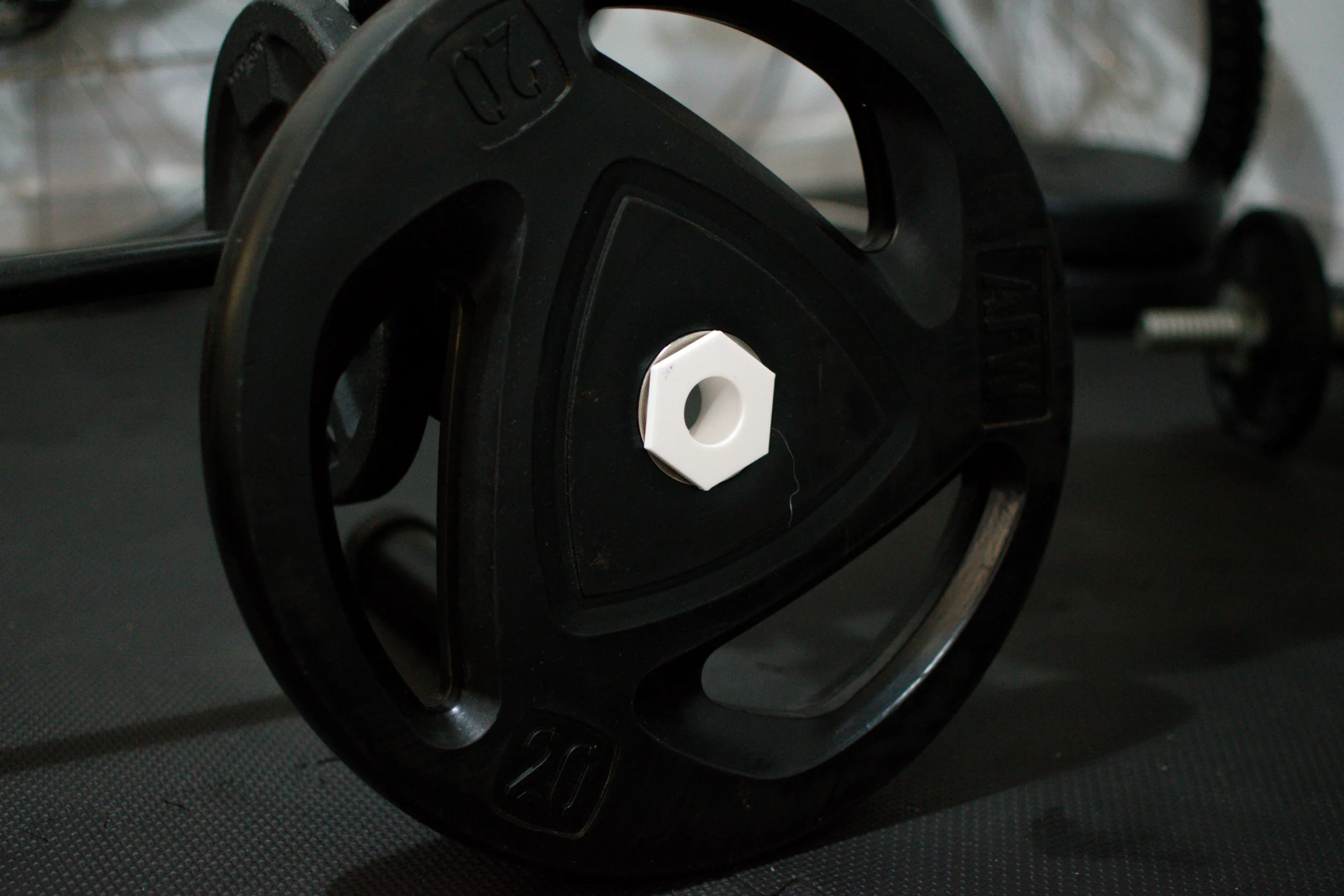 Adaptador disco olímpico a 28 mm